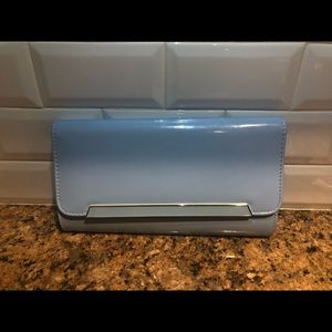 Light blue patten clutch